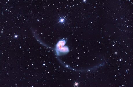 The Magnificent Collision of Antennae Galaxies: A Cosmic Dance of Destruction and Creation